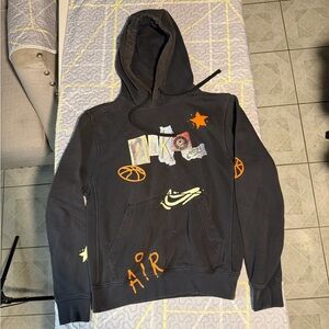 Nike Black Hoodie with Orange and White Graphics